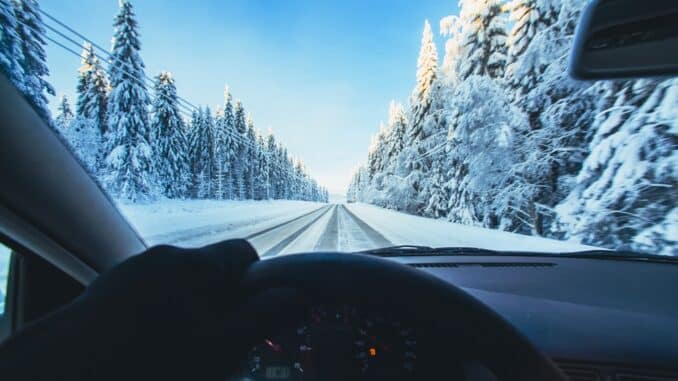 car driving through snow