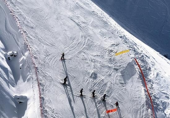 six skiers