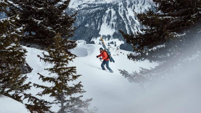 skier in red jacket