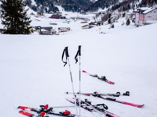 skis & poles in snow